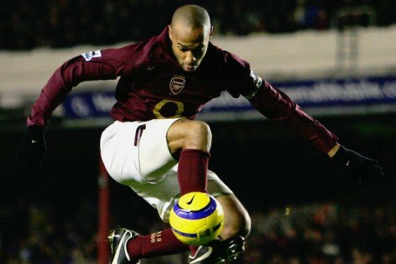 hi-res-56505707-thierry-henry-of-arsenal-controls-the-ball-during-the_crop_north